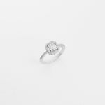 The Illusion Silver Ring showcases a rectangular center made of baguette-cut zircons, framed by two rows of sparkling round stones.