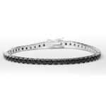 The Black Stone Tennis Bracelet is a bold and elegant accessory crafted from fine silver and shimmering zircon stones.
