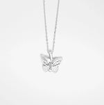 The Butterfly Hidden Heart Necklace is a beautifully crafted fine silver piece with sparkling zircon stones. What makes it truly special is its unique design; the butterfly’s wings unfold to reveal a hidden heart inside, perfect for engraving a personal message.