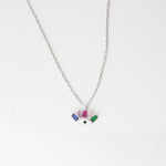 Playful yet powerful, the Colorful Eye Necklace brings a burst of color and charm to your style. Set in pure silver, the eye motif is adorned with radiant baguette-cut zircon stones in vibrant shades of green, pink, yellow, and blue.