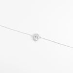 Elegant and full of light, the Crystal Wing Halo Bracelet features a brilliant oval crystal surrounded by a halo of sparkling zircon stones. Set in real silver, its delicate design adds a graceful glow to any look.