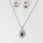 Designed for comfort and confidence, this Emerald Crown Half Set brings a fresh, uplifting vibe wherever you go. Crafted in fine silver, the set features a stunning crown-like frame filled with sparkling zircon stones, centered by a vivid green gem.