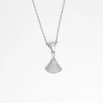 Graceful and eye-catching, the Fan Pendant Necklace brings a fresh twist to timeless elegance. Shaped like a delicate fan, this silver piece sparkles with layered zircon stones that catch the light from every angle.