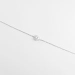 The Halo Heart Bracelet showcases a radiant crystal heart at its center, framed by a halo of shimmering zircon stones