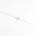 The Hamsa Hand Bracelet features a beautifully detailed charm shaped like the iconic protective hand, encrusted with bright zircon stones and a crystal eye at the center.