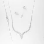 Gracefully bold, the Leaf Curve Full Set brings timeless elegance to life with its sculpted silver design and brilliant zircon stones. From the flowing necklace to the matching bracelet, drop earrings, and curved ring, each piece follows a delicate leaf-inspired curve that hugs the skin with subtle sparkle.