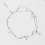 Add a spark to your summer style with the Lightning Cloud Anklet. Crafted from fine silver, this double-layered piece features playful cloud and lightning charms with shiny silver beads dancing between them.