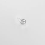 The Pear Shine ring features a teardrop-shaped center, beautifully outlined with shimmering crystals and zircon stones.