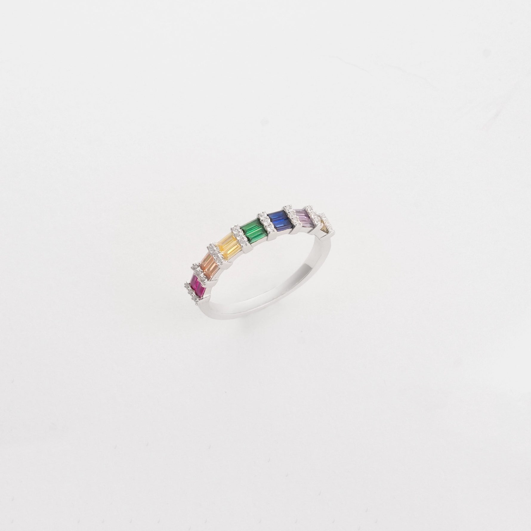 high-quality sterling silver guaranteeing lasting brilliance and comfort. Enhanced by delicate zircon accents between each color.