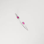 his sleek Red Mirage Silver Bangle features two oval red crystal stones, each framed with delicate sparkling stones. Light, elegant, and easy to wear