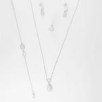 Elegant from every angle, the Tear Drop Full Set is a timeless silver collection designed to shine. Featuring a teardrop-shaped pendant necklace, matching earrings, a delicate bracelet, and a graceful ring — each piece is adorned with brightening zircon stones that sparkle with every movement.