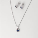 The Royal Elegance Half Set brings a graceful glow to any look. Made from fine silver, this stylish duo features a rich blue crystal at the center, surrounded by bright zircon stones that add just the right amount of sparkle.