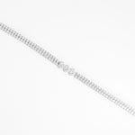 The Triple Glow Silver Bracelet features two rows of bright zircon stones leading to a stunning trio of larger center crystals.