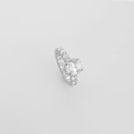 The Crown Silver Ring features a stunning oval-shaped center stone, surrounded by bright stones accents and a band fully lined with matching sparkle.