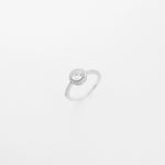 The Halo Glow ring features a round center stone surrounded by a double halo of bright zircon stones, all set in solid silver.