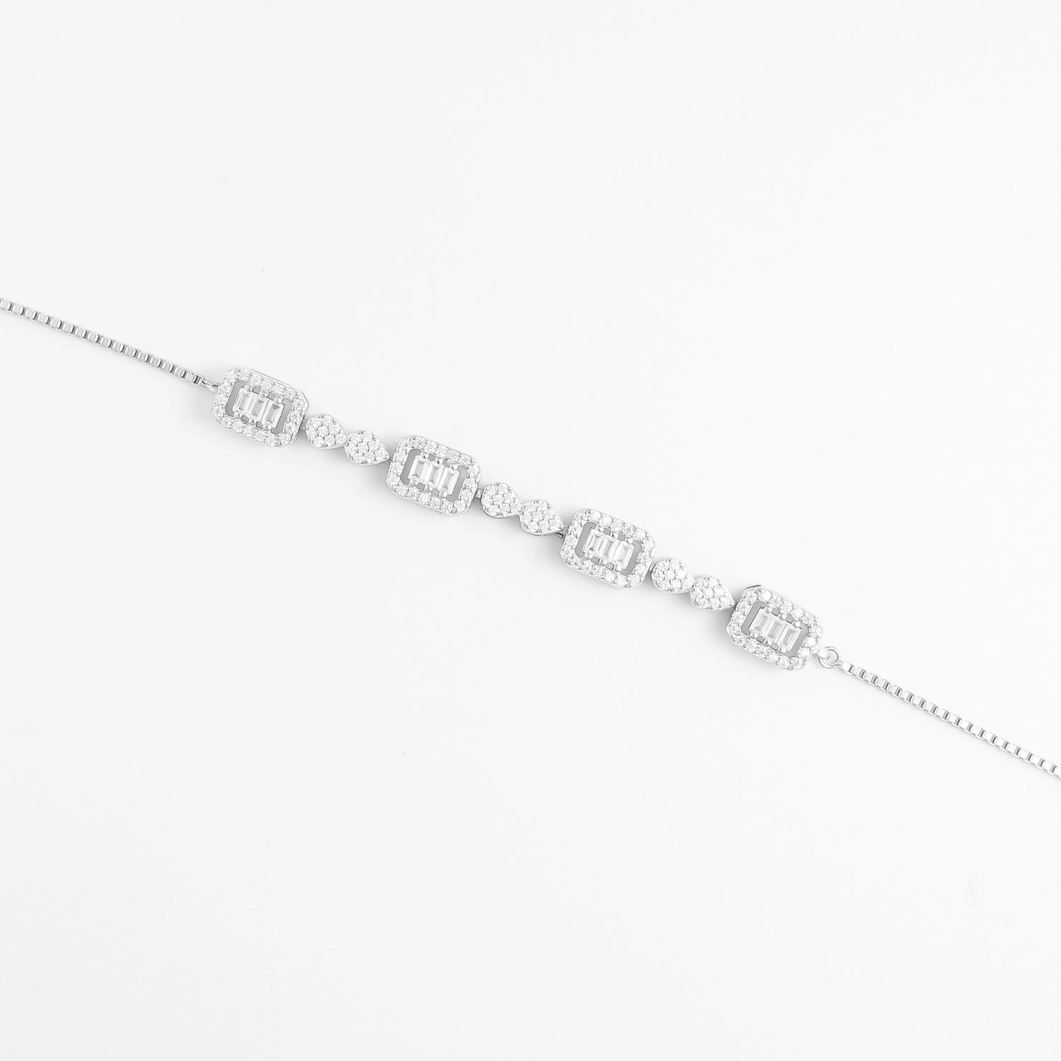 The Emerald Sparkling Bracelet is designed with radiant baguette-cut stones, perfectly set within square frames and accented by bright zircon crystals.