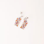 Add a pop of color to your style with these Rainbow Shard Earrings. Crafted from fine silver, they feature bright, colorful shards that sparkle with every move.