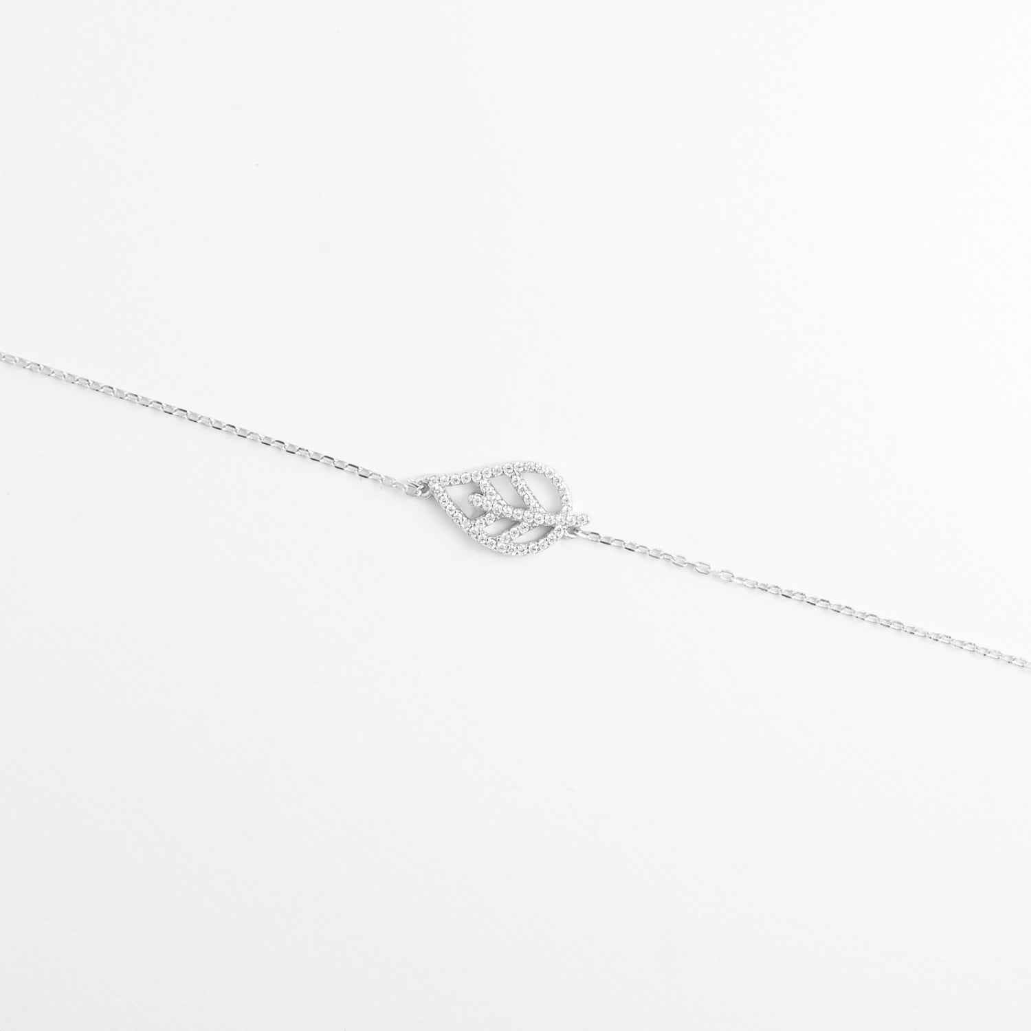 The Leaf Shine Bracelet features a graceful open-leaf design, outlined with bright zircon stones.