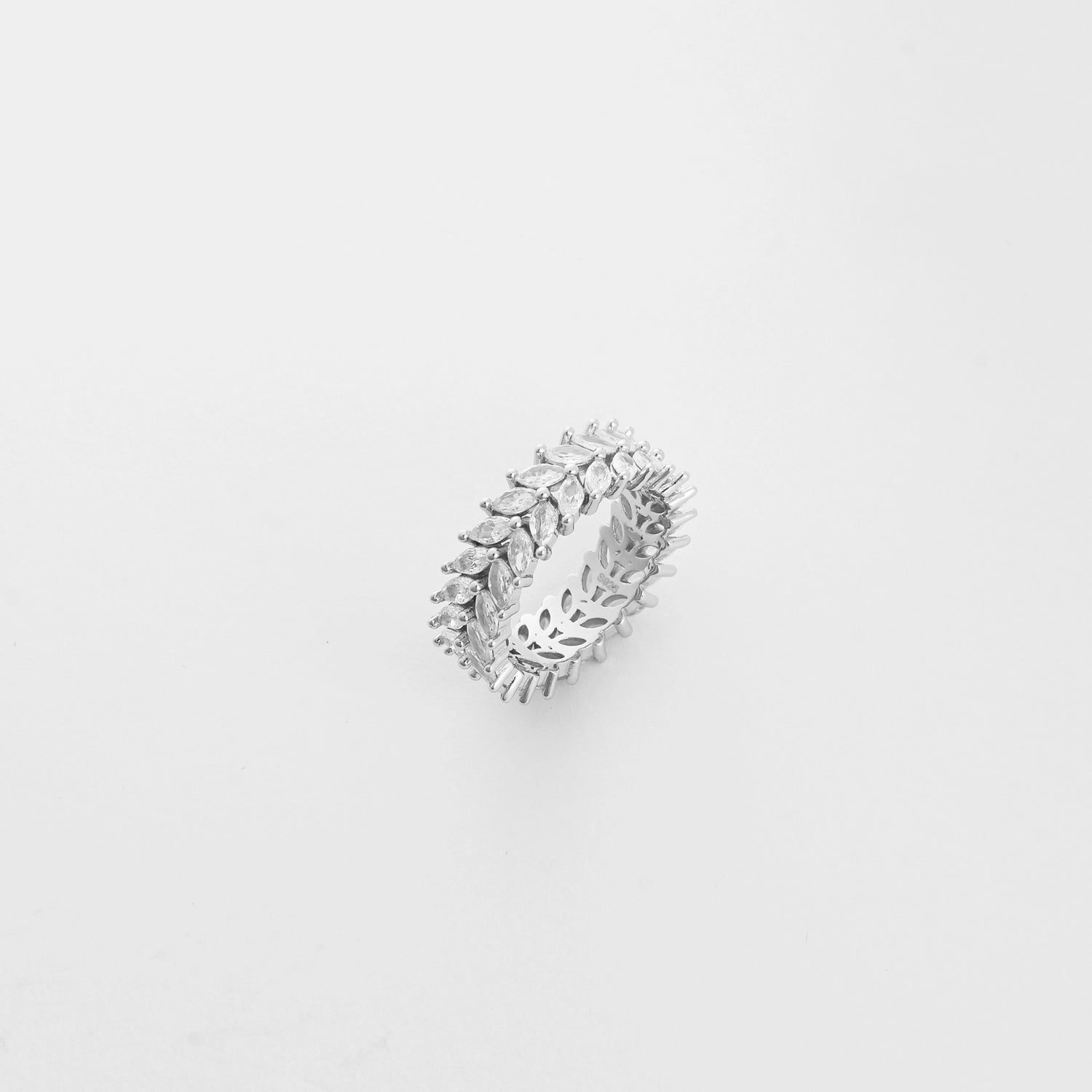 The Leaf Band ring features a graceful vine design, with marquise-cut crystals set like shining leaves around the band.